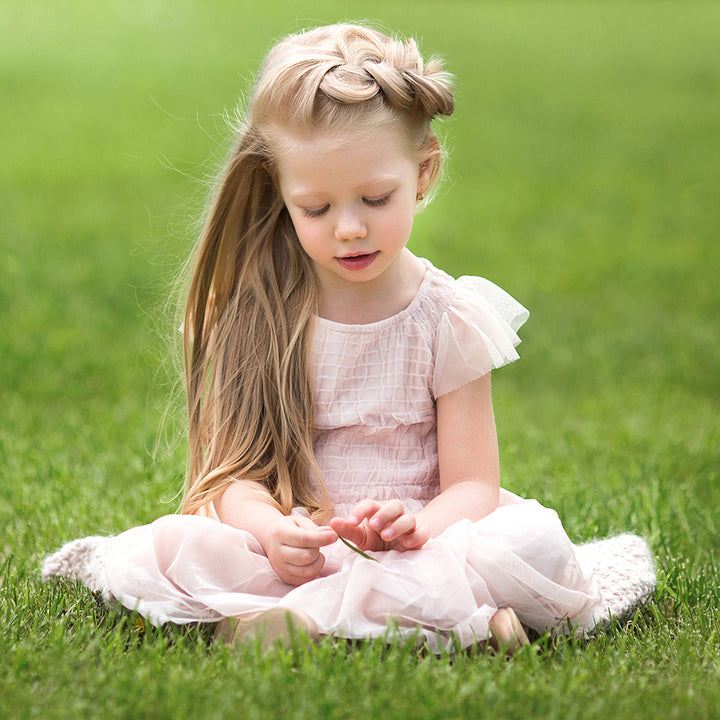 happy little girl on 40mm artificial grass